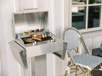 coyote 18-inch built-in / portable 1300 watt electric grill on patio post
